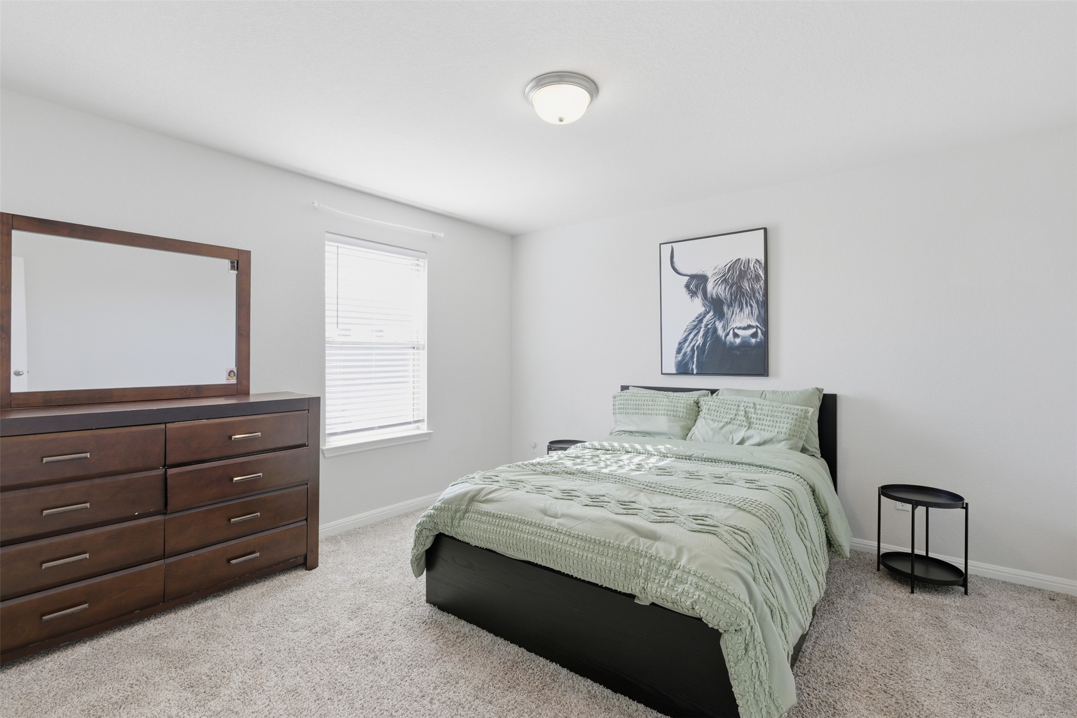 431 Dipprey Lane Georgetown, TX 78628 - Photo 29 of 39 a bedroom with a bed and a window