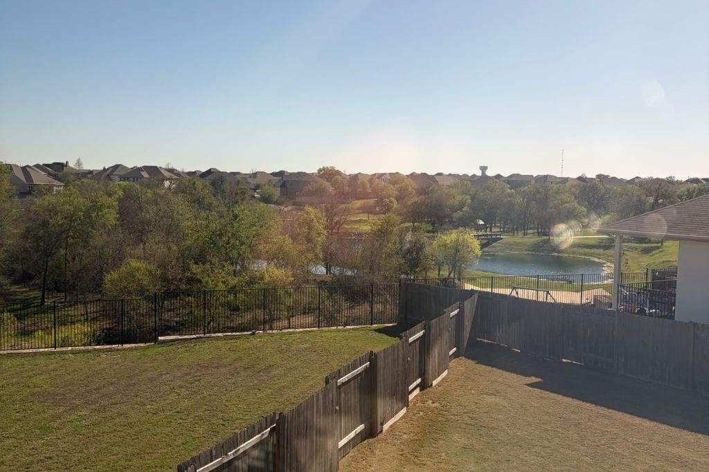 431 Dipprey Lane Georgetown, TX 78628 - Photo 35 of 39 a view of a lake with a mountain