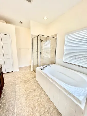 a view of a garden with a pathway