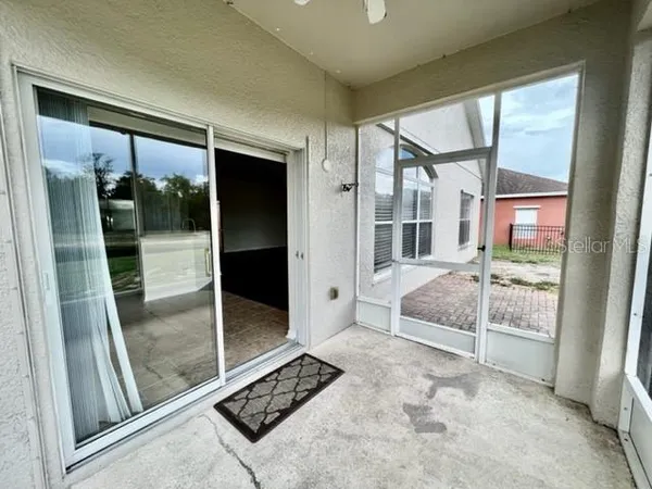 an aerial view of residential house with outdoor space and lake view