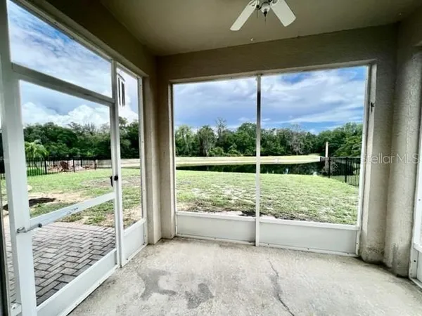 an aerial view of a house with outdoor space