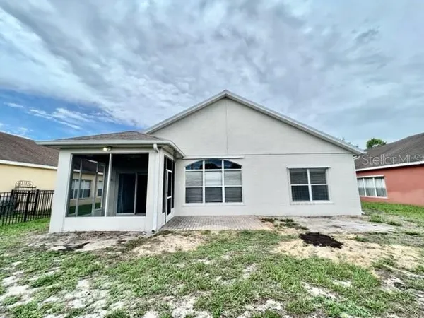 a view of a balcony with wooden floor and fence