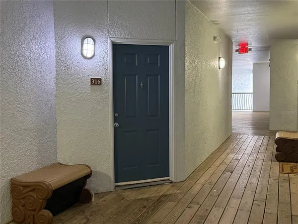 a view of livingroom with furniture and wooden floor