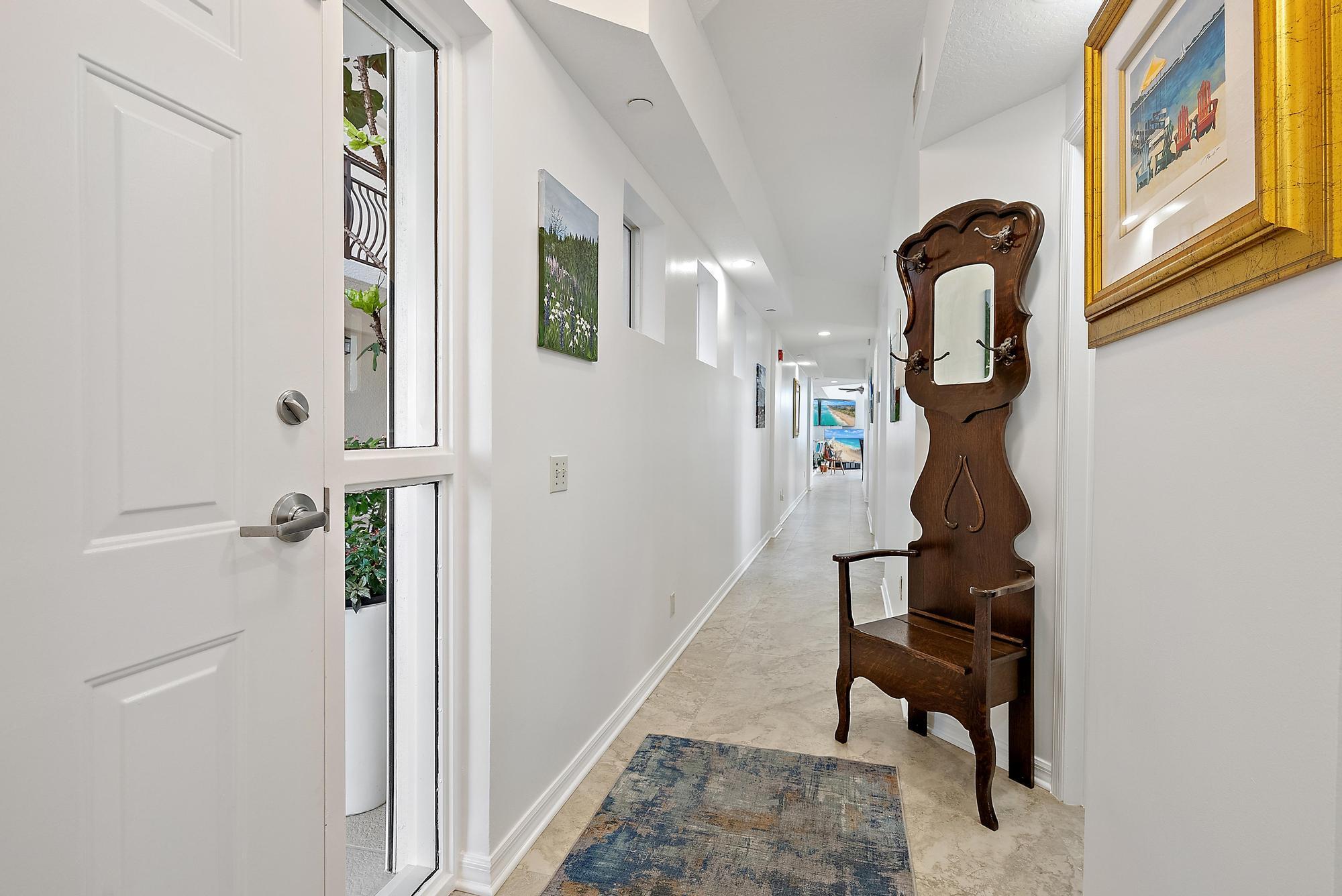314 Inlet Way, Unit 103 Palm Beach Shores, FL 33404 - Photo 13 of 20 a view of entryway
