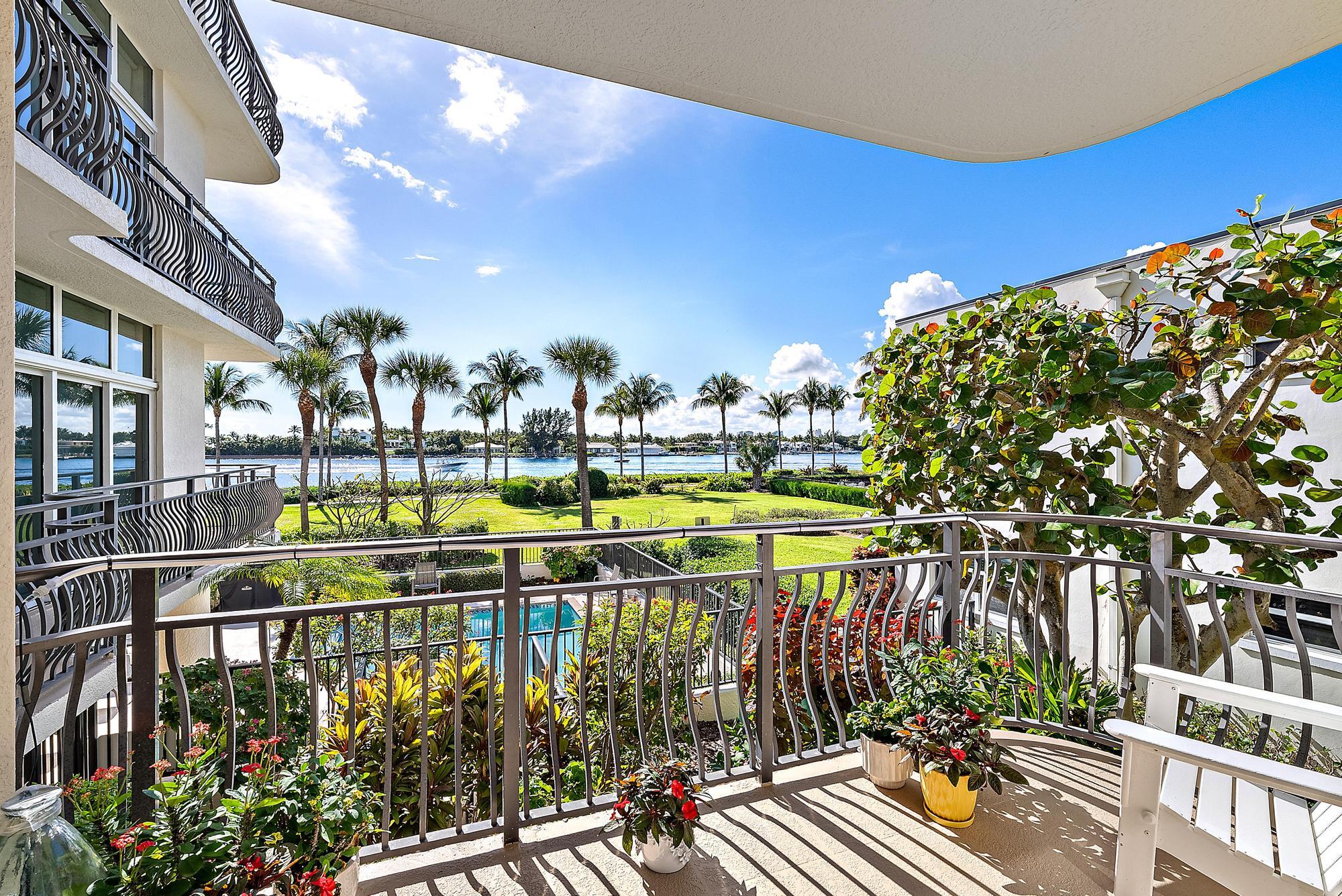 314 Inlet Way, Unit 103 Palm Beach Shores, FL 33404 - Photo 4 of 20 a view of swimming pool from a balcony