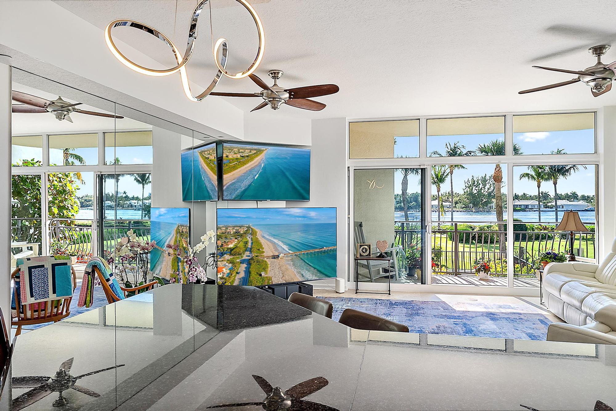 314 Inlet Way, Unit 103 Palm Beach Shores, FL 33404 - Photo 5 of 20 a living room filled with furniture