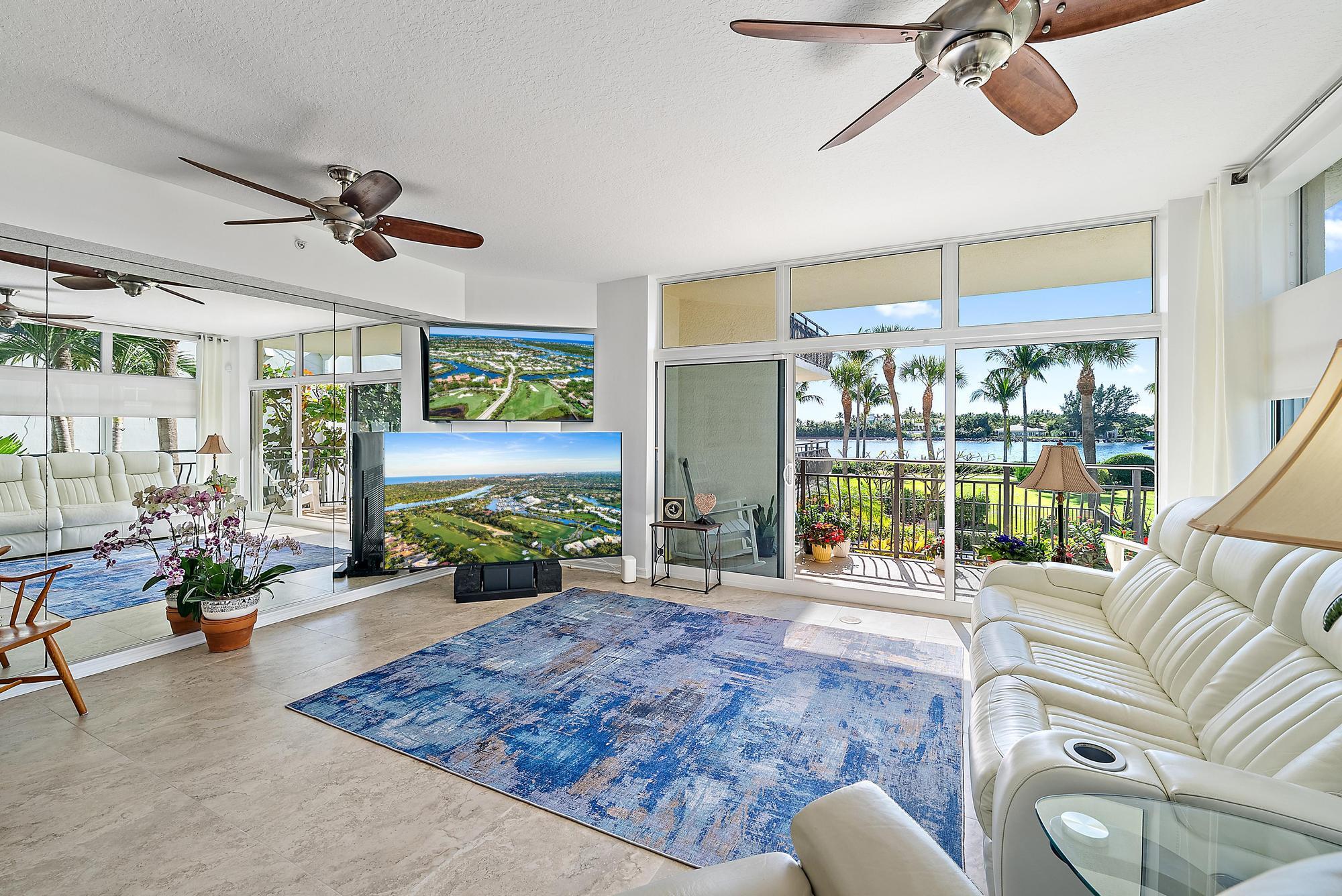 314 Inlet Way, Unit 103 Palm Beach Shores, FL 33404 - Photo 6 of 20 a living room with furniture