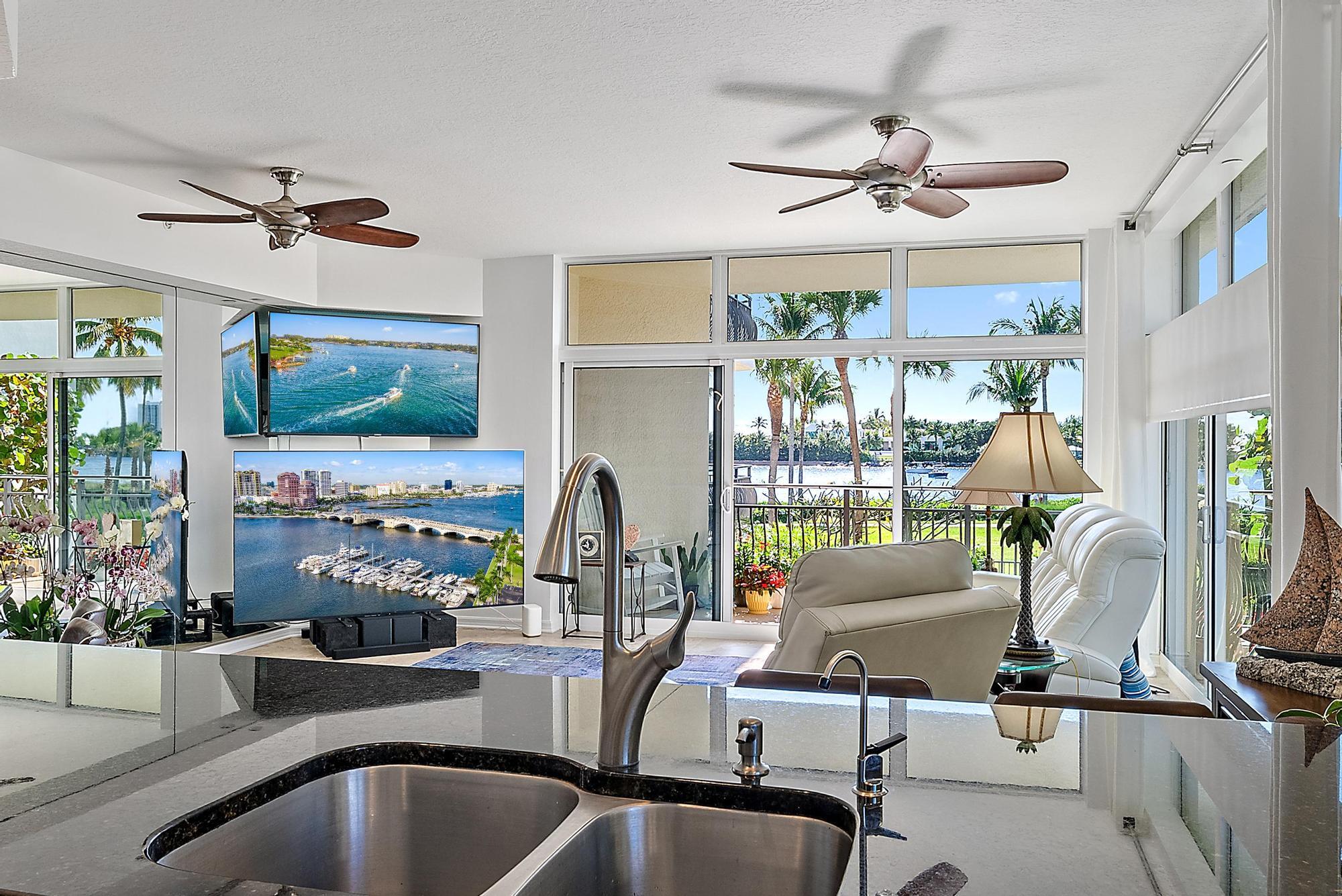 314 Inlet Way, Unit 103 Palm Beach Shores, FL 33404 - Photo 8 of 20 a view of a dining room with furniture window and outside view