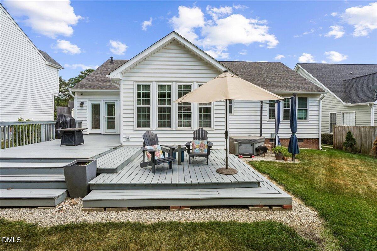 3331 Swinford Court Raleigh, NC 27604 - Photo 6 of 27 a view of a house with backyard porch and sitting area