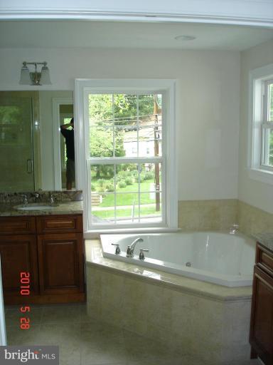322 Franklin Avenue Silver Spring, MD 20901 - Photo 13 of 23 Master bath with double vanities.