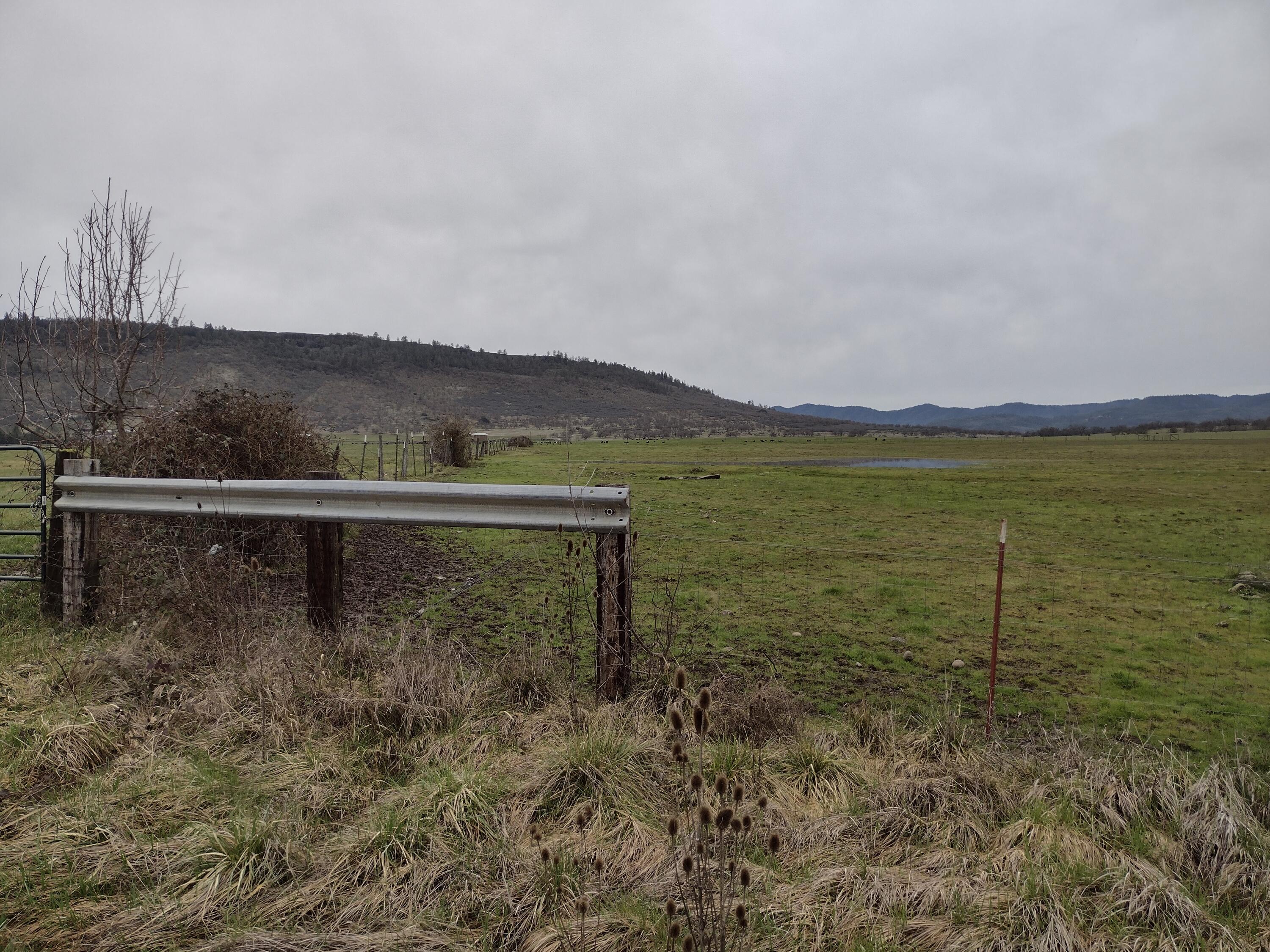 0 Modoc Road White City, OR 97503 - Photo 1 of 6 a view of a lake with a mountain in the background