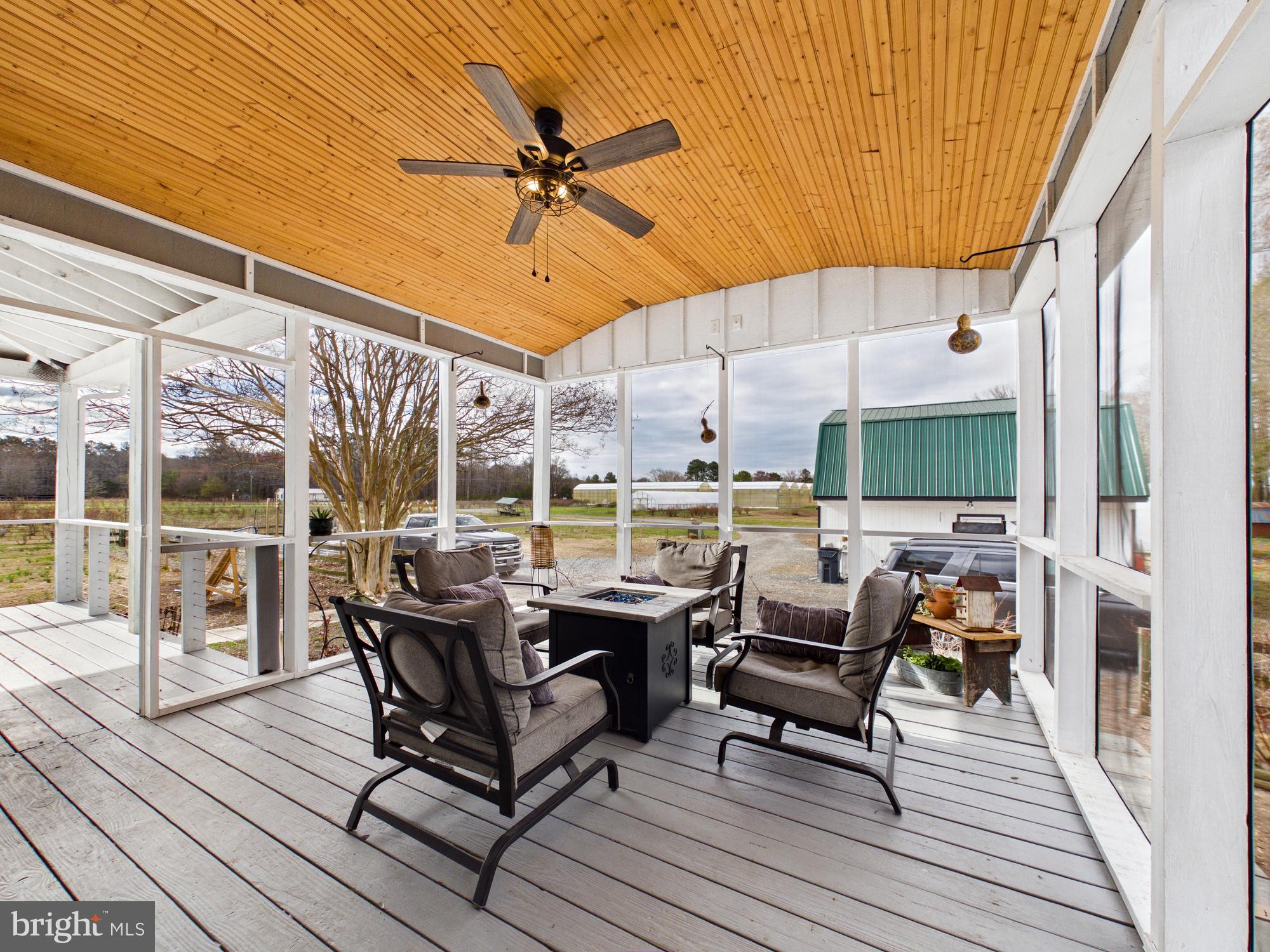 8416 Harmony Road Denton, MD 21629 - Photo 48 of 111 Screened in porch, ready for summer nights