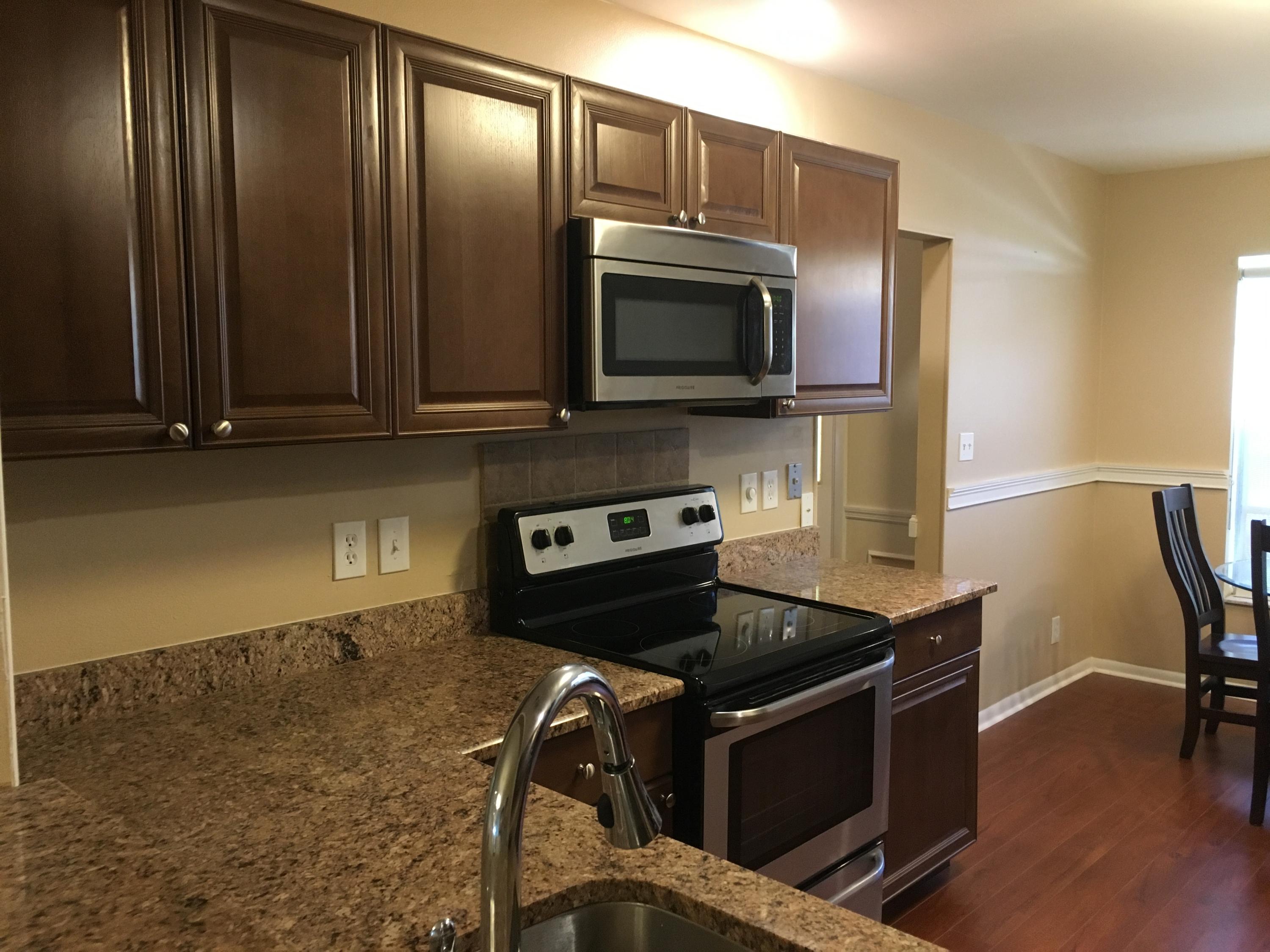 7200 Pine Manor Drive Lake Worth, FL 33467 - Photo 2 of 48 kitchen looking in from counter left