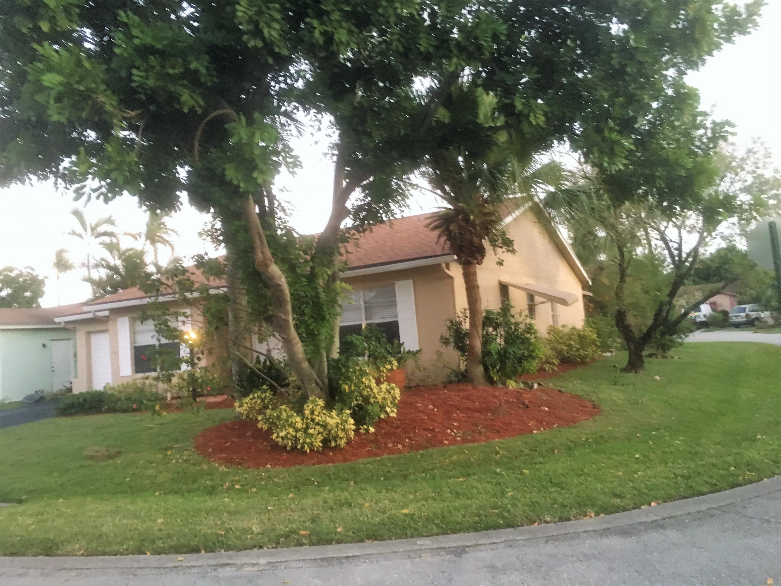 7200 Pine Manor Drive Lake Worth, FL 33467 - Photo 45 of 48 front corner