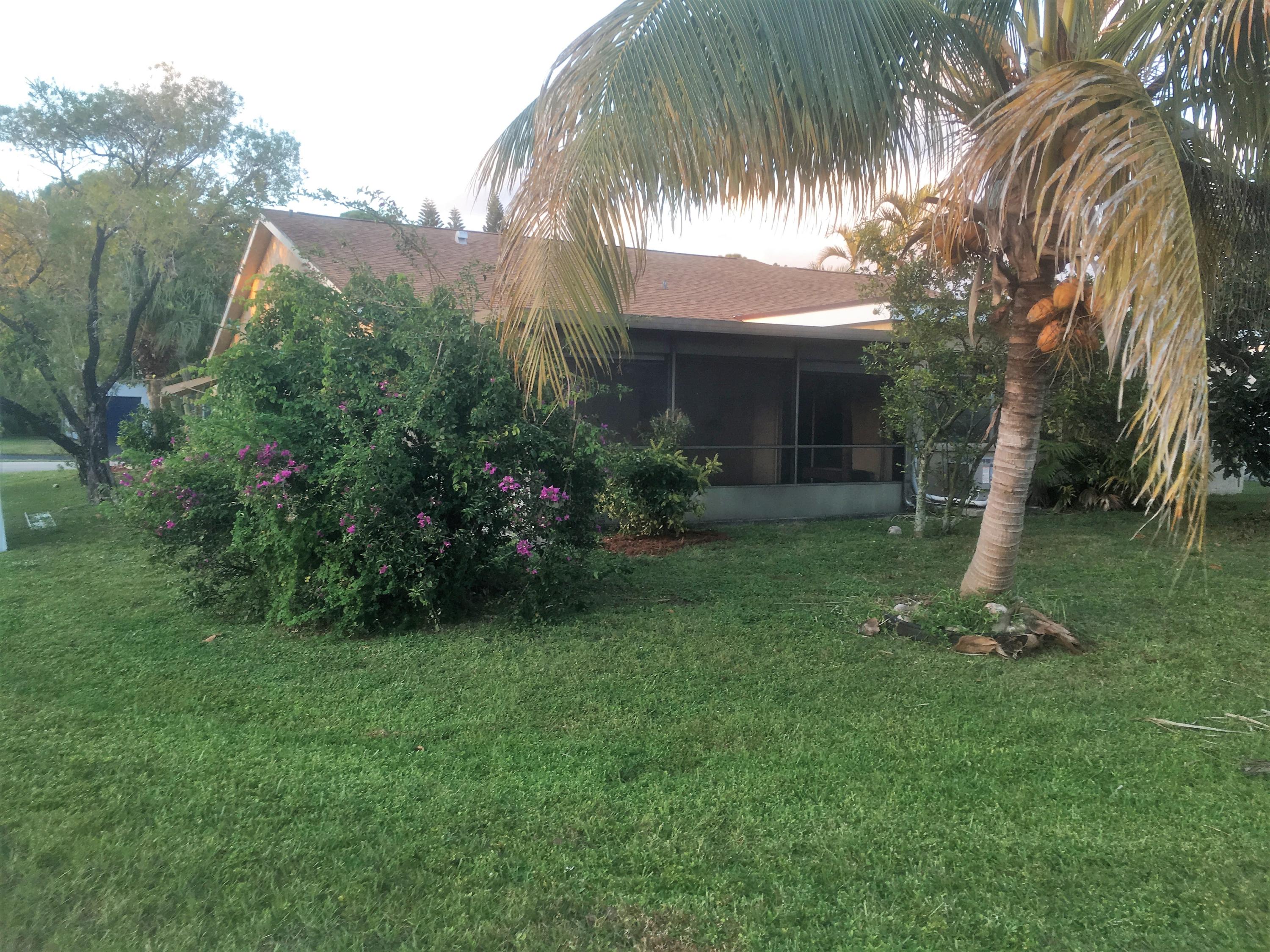 7200 Pine Manor Drive Lake Worth, FL 33467 - Photo 46 of 48 back corner of house