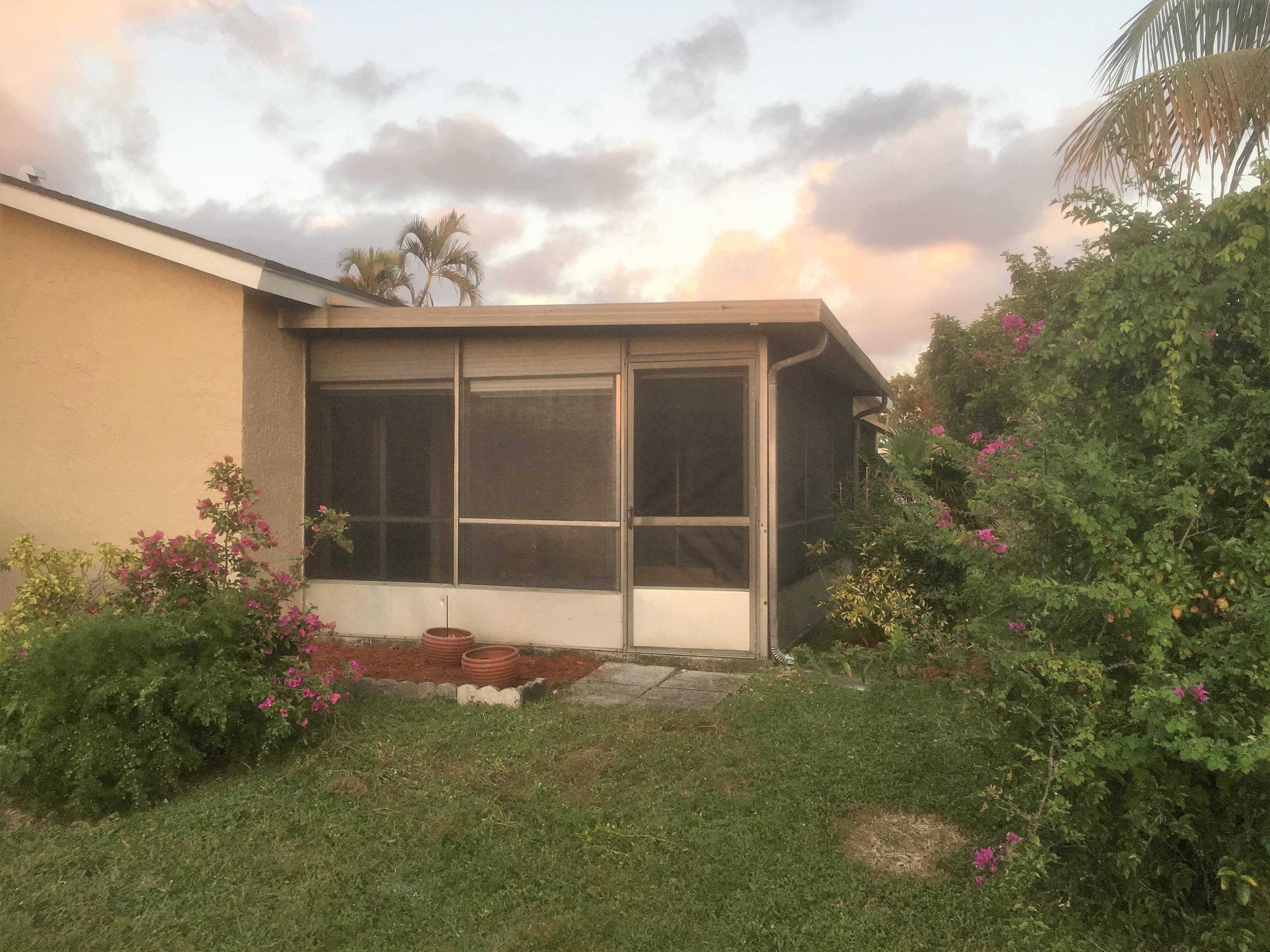 7200 Pine Manor Drive Lake Worth, FL 33467 - Photo 47 of 48 screend patio