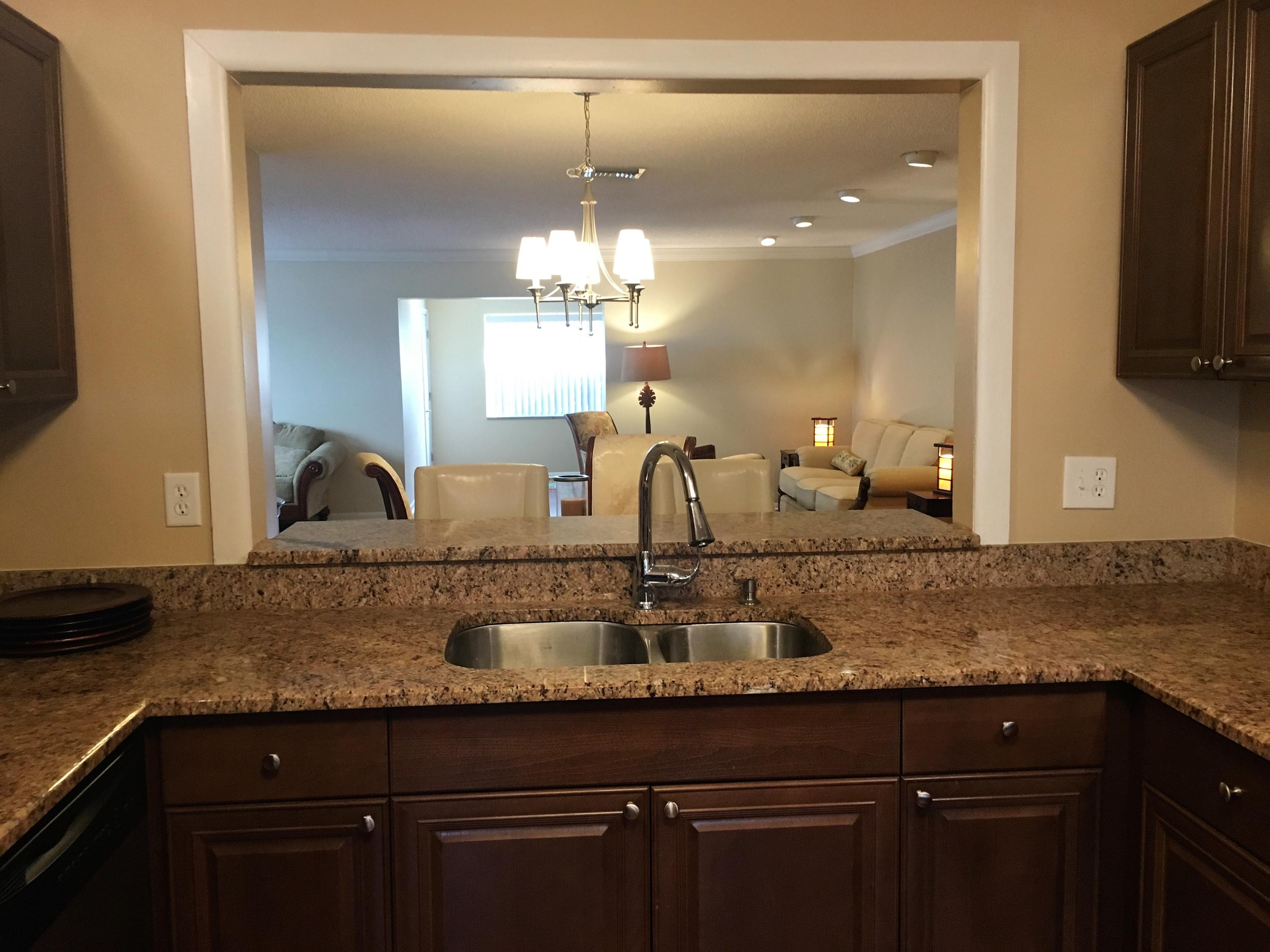 7200 Pine Manor Drive Lake Worth, FL 33467 - Photo 7 of 48 kitchen looking out