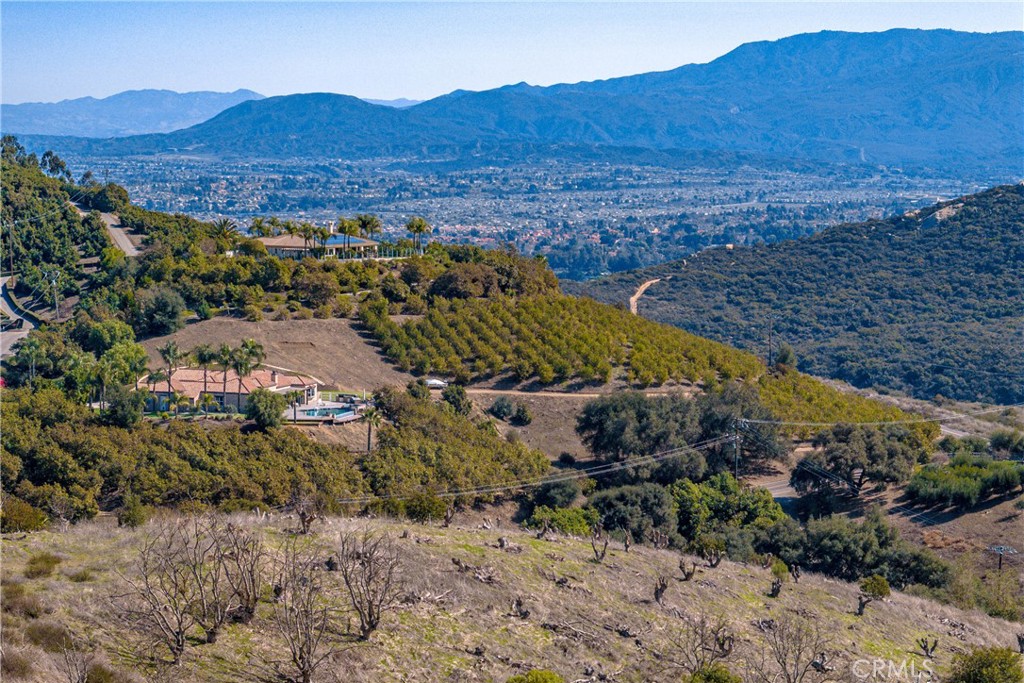 5 Vía Gorrion Temecula, CA 92590 - Photo 7 of 12 a view of a lush green hillside and houses