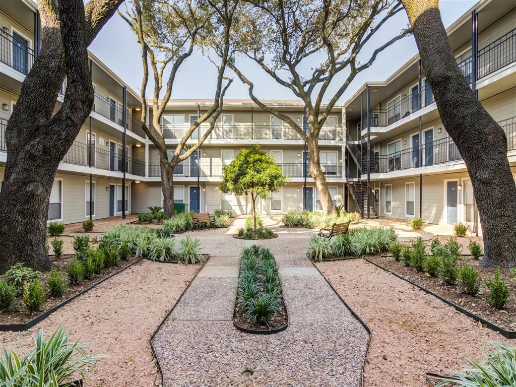 7315 Brompton Road, Unit 315B Houston, TX 77025 - Photo 11 of 13 a front view of a multi story residential apartment buildings