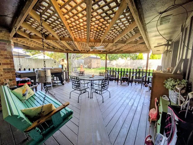 a view of a patio with couches table and chairs