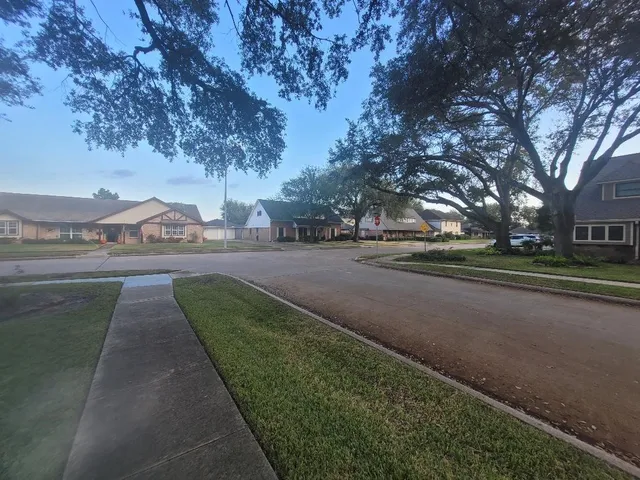 a view of street with houses