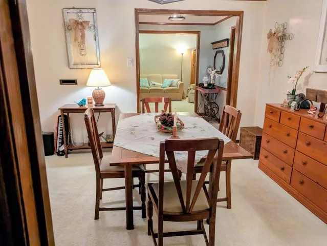 a view of a dining room with furniture