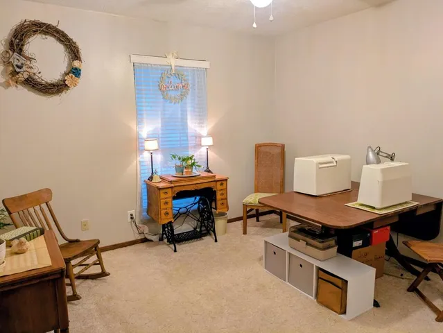 a room with furniture and air hockey table