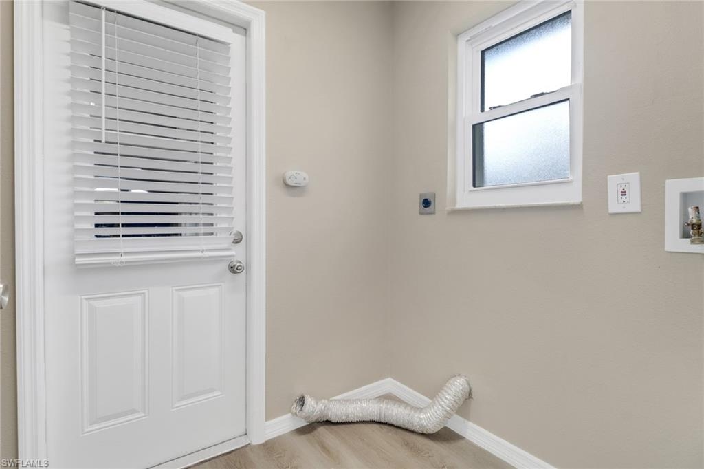 4599 Mongite Road North Port, FL 34287 - Photo 20 of 28 a view of a bedroom with a window