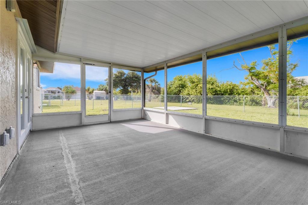 4599 Mongite Road North Port, FL 34287 - Photo 22 of 28 a view of an empty room with a large window