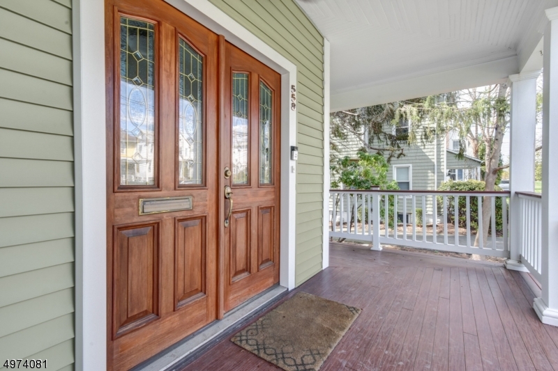 558 Summit Avenue, Unit 1 Westfield, NJ 07090 - Photo 13 of 13 a view of a balcony with wooden floor