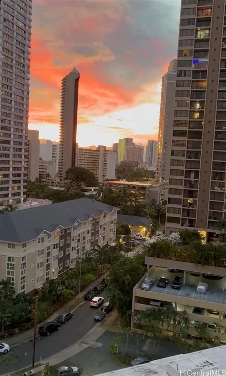 425 Ena Road, Unit 1207B Honolulu, HI 96815 - Photo 4 of 11 a city view with tall buildings