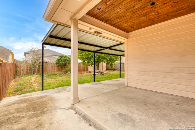 a view of a backyard of a house