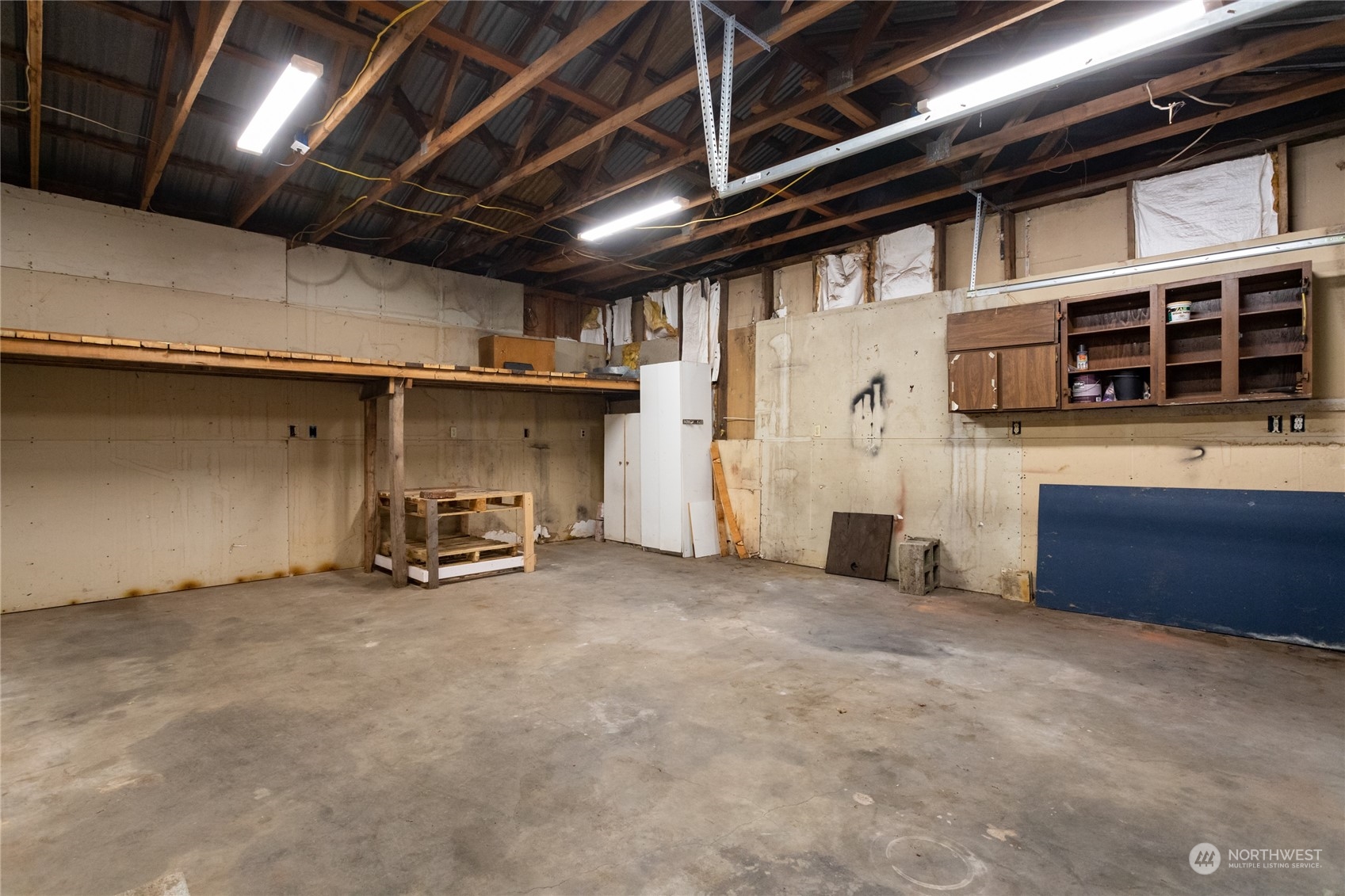 1187 West Axton Road Ferndale, WA 98248 - Photo 31 of 40 a view of a room with wooden walls