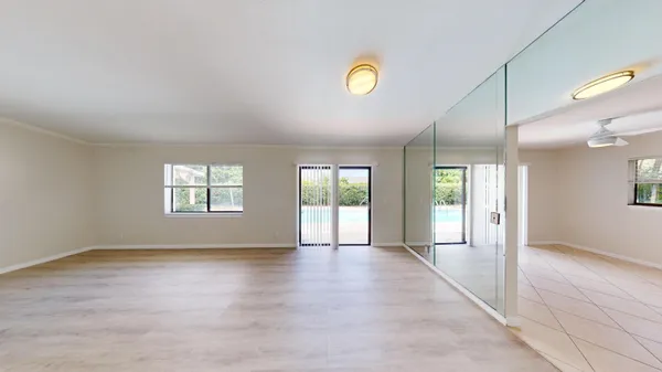 a view of an empty room with a window