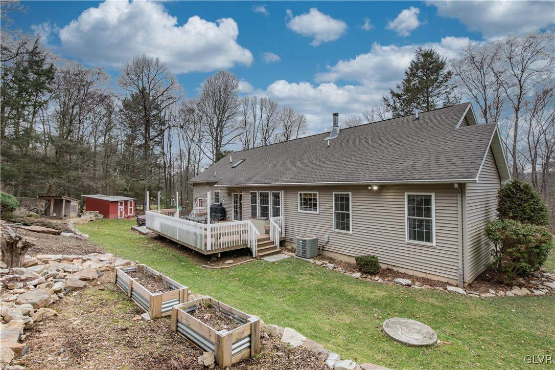 2431 Point Phillips Road Kunkletown, PA 18058 - Photo 56 of 67 a view of a house with backyard and sitting area