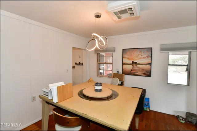 a bathroom with a sink a mirror and a window