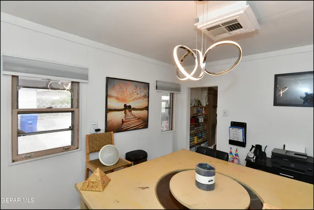 a kitchen with stainless steel appliances granite countertop a refrigerator stove and sink