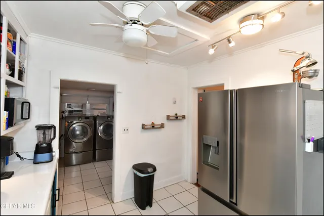 a close view of a sink and cabinets