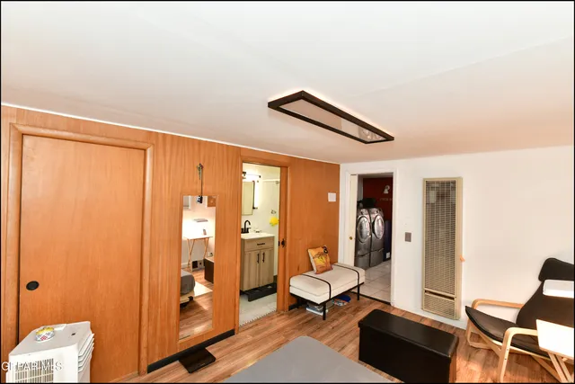 a view of a room with a bathroom