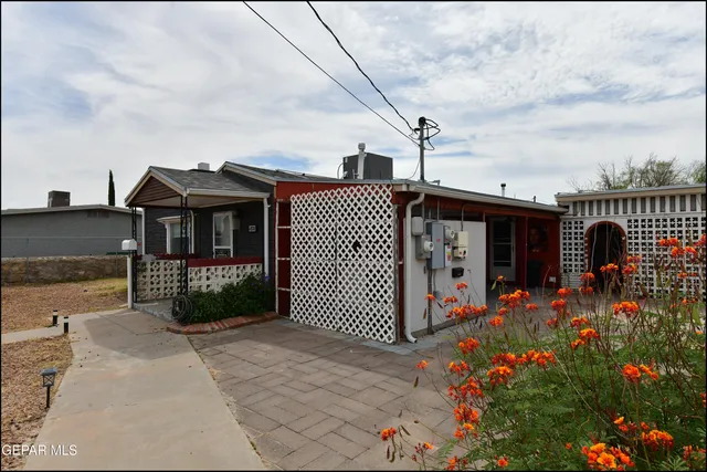 a front view of a house with a garage