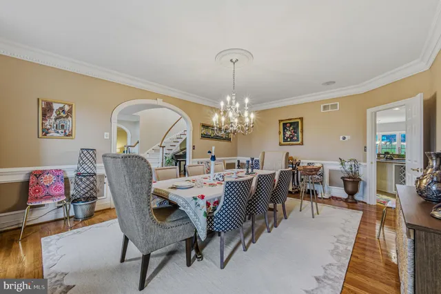 a kitchen with granite countertop a sink and cabinets