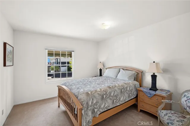 a bedroom with furniture and a couch