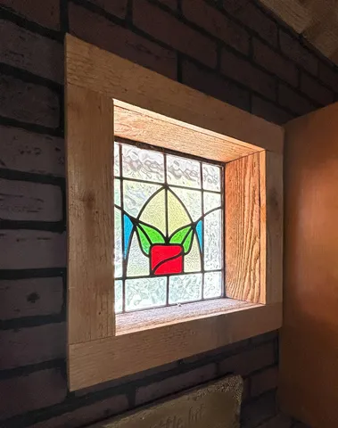 a bathroom with a double vanity sink and mirror