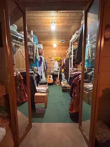 a bed room with a bed and a window