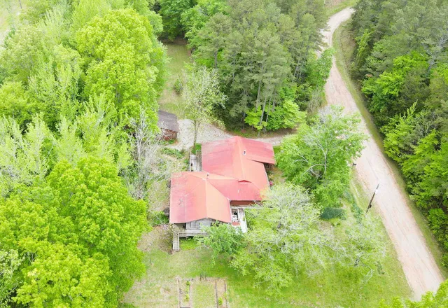 a view of a sign board with a park