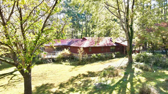 a view of a lake with a yard