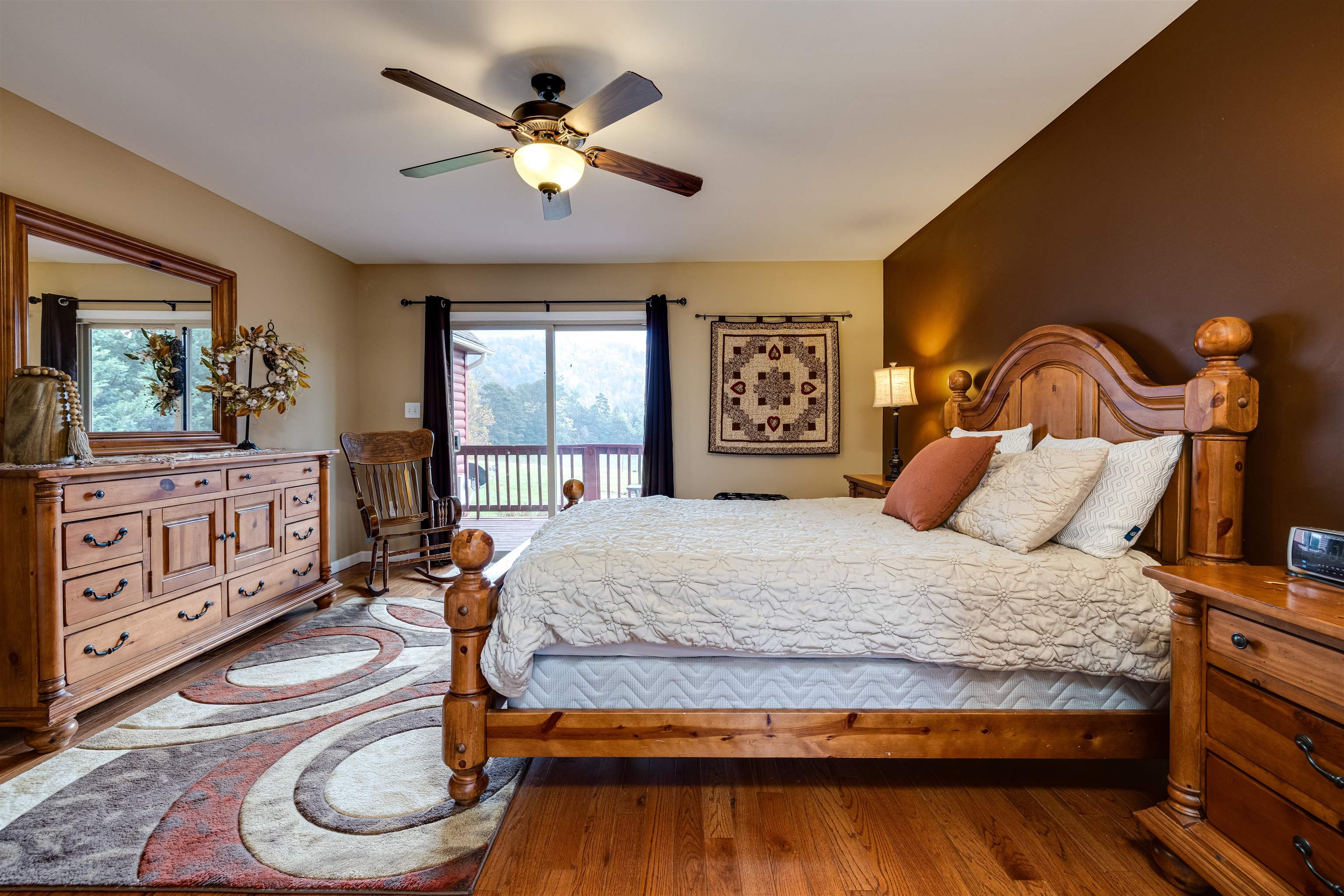 2225-2319 Valley Burg Road Luray, VA 22835 - Photo 14 of 57 a bedroom with a bed a dresser and next to windows