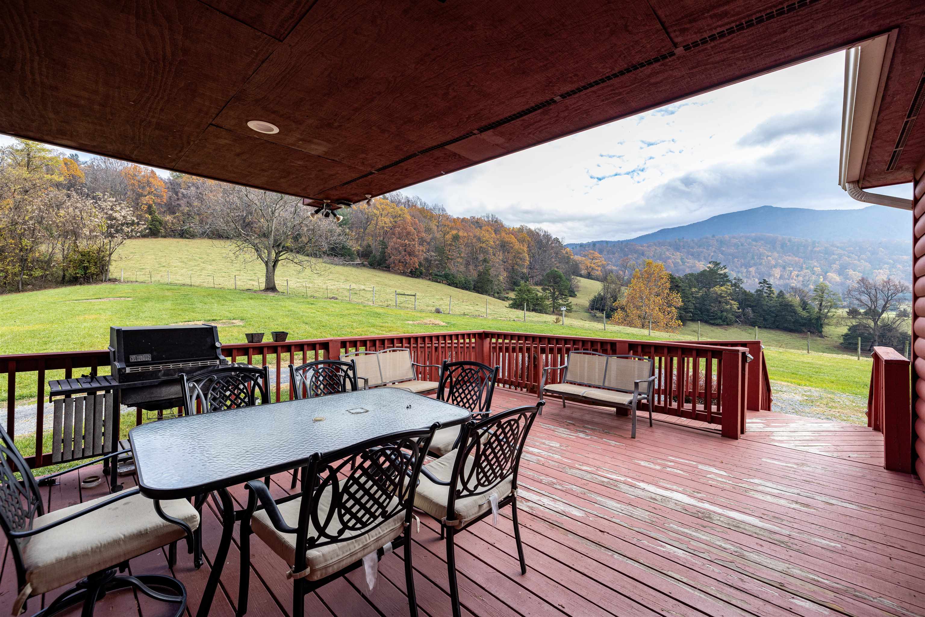2225-2319 Valley Burg Road Luray, VA 22835 - Photo 29 of 57 a view of a chairs and table on the wooden roof deck