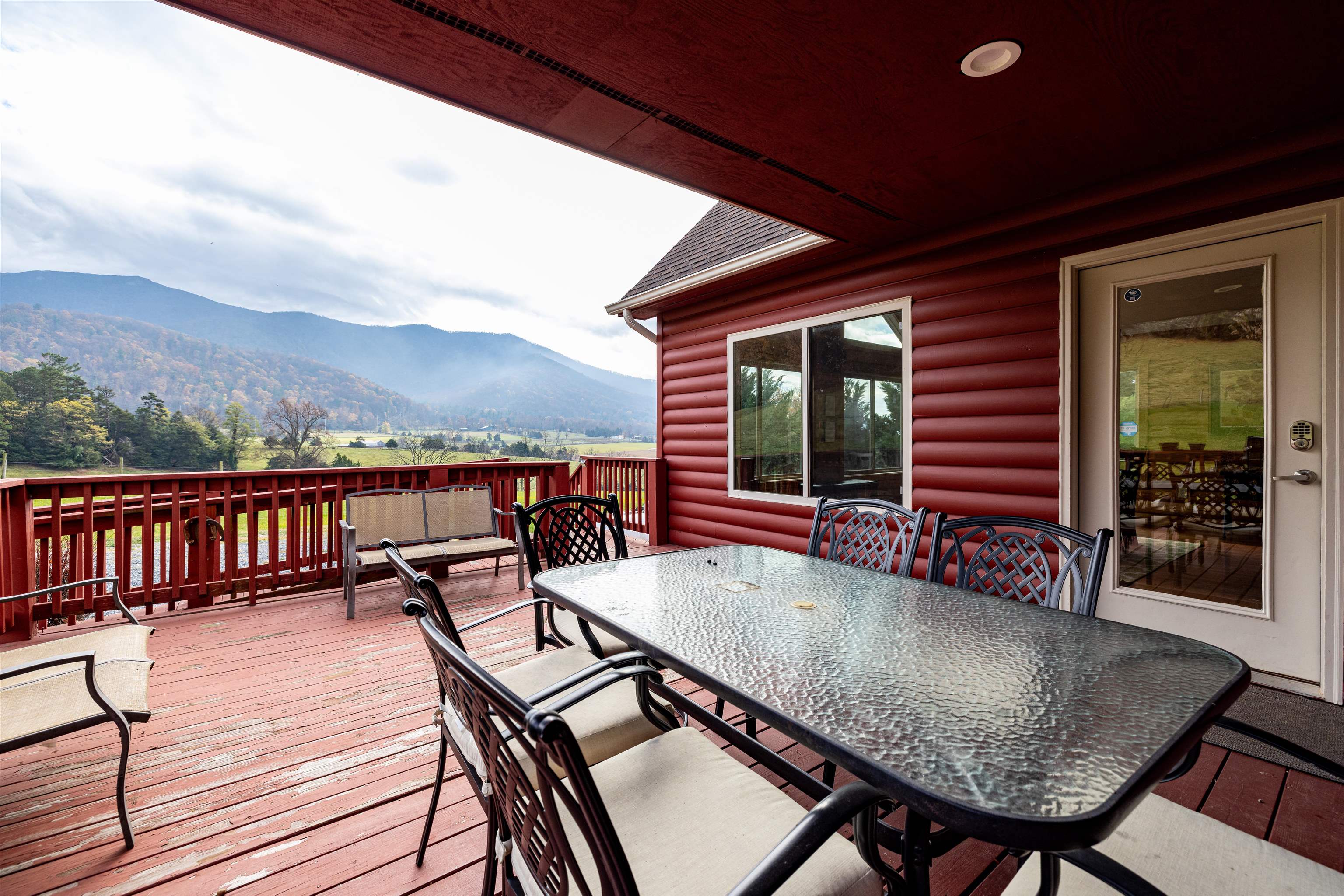 2225-2319 Valley Burg Road Luray, VA 22835 - Photo 30 of 57 a view of a chairs and table in the balcony