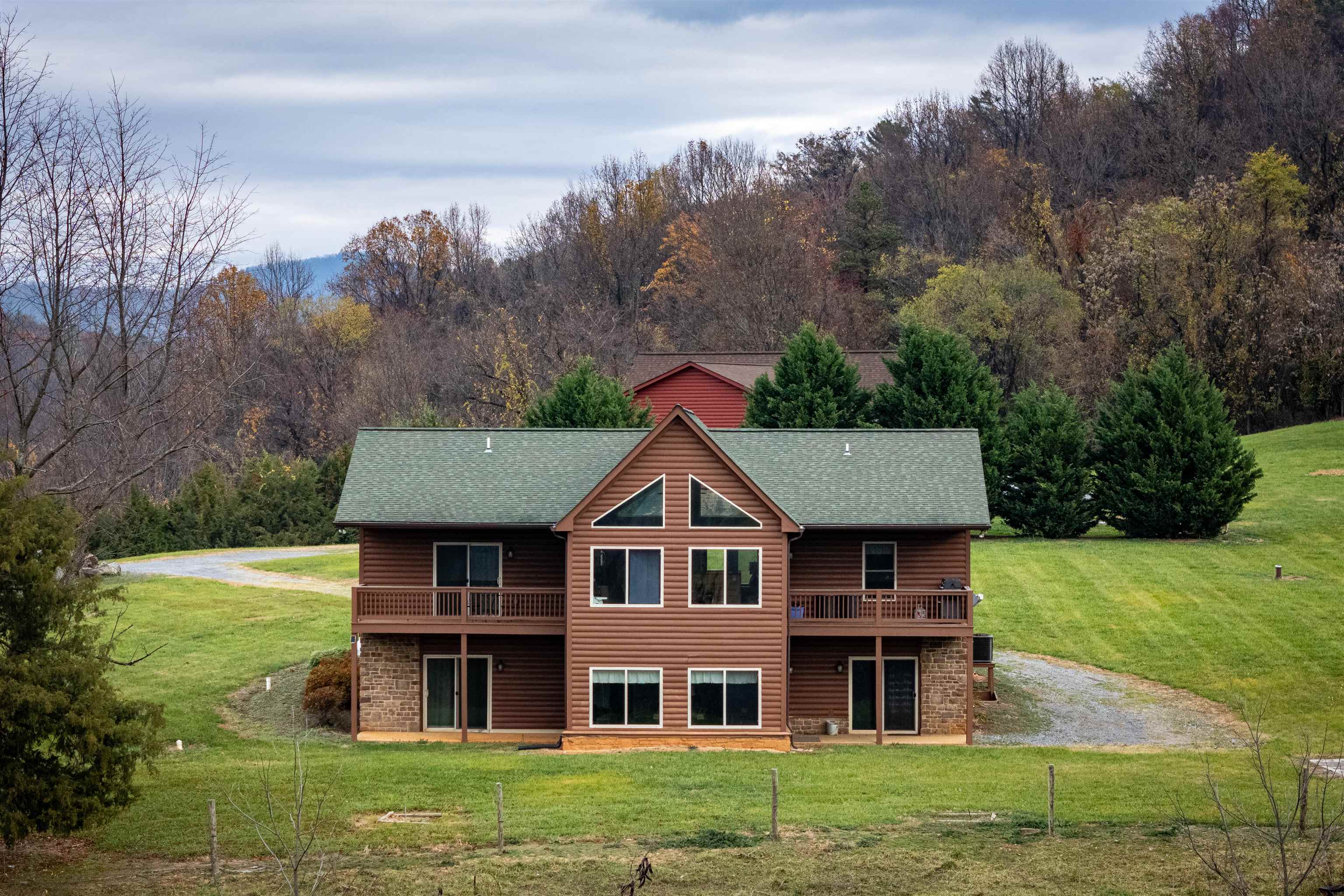 2225-2319 Valley Burg Road Luray, VA 22835 - Photo 32 of 57 a aerial view of a house next to a big yard and large trees